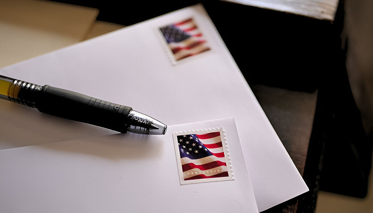 US flag postage stamp on an envelope